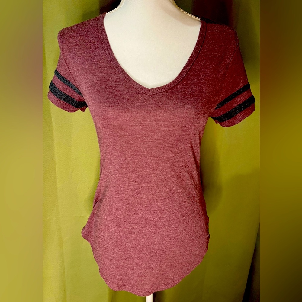 Cute form fitting, v-neck top.